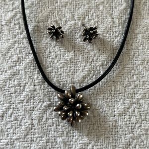 Silver fireworks necklace and earrings.